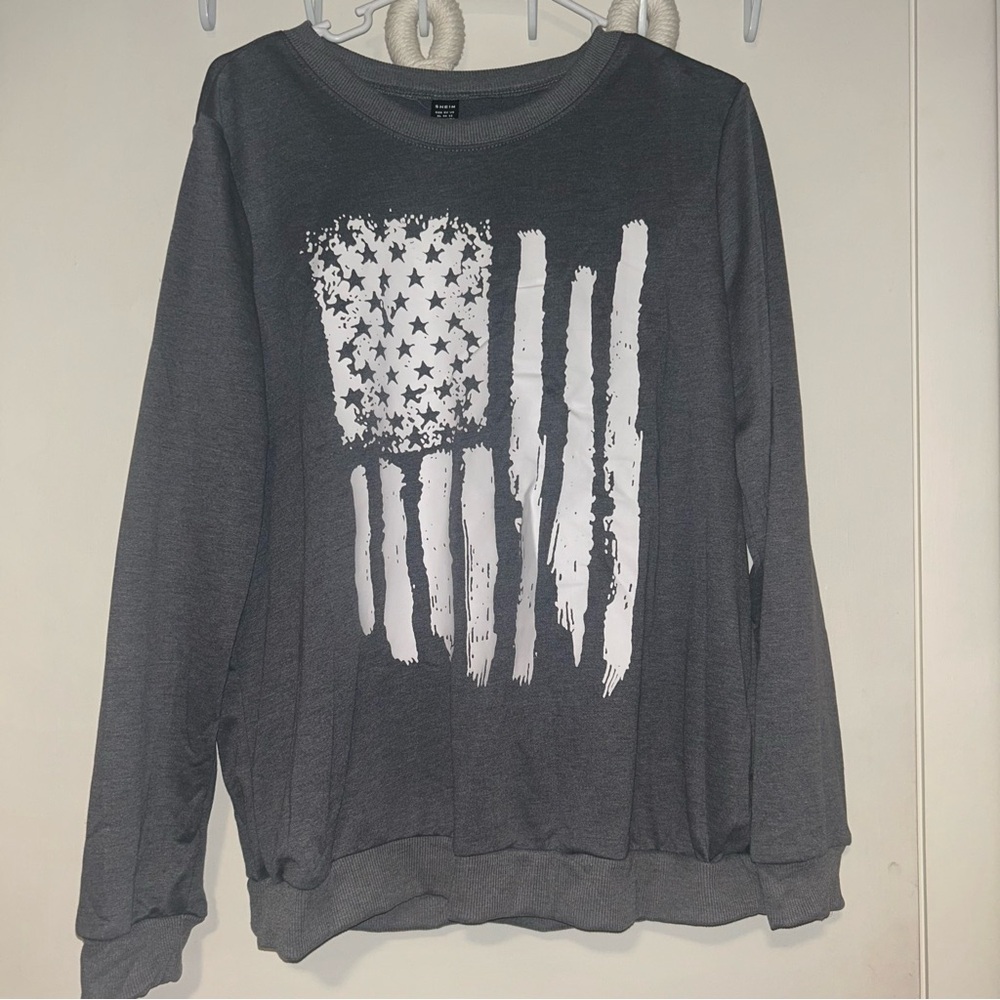 Gray Sweatshirt with White Flag Design